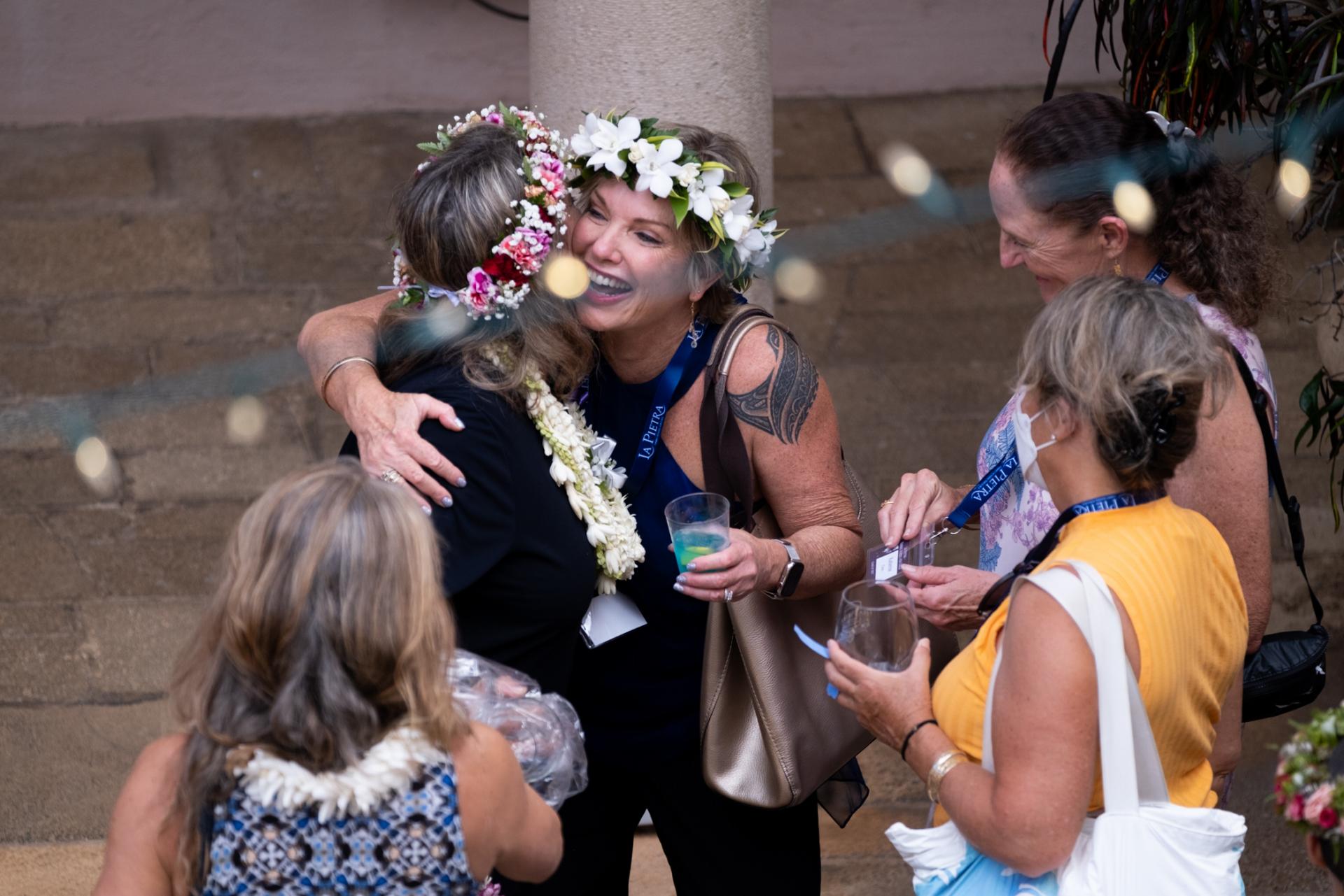 Alumnae reunite in the Fountain Courtyard.